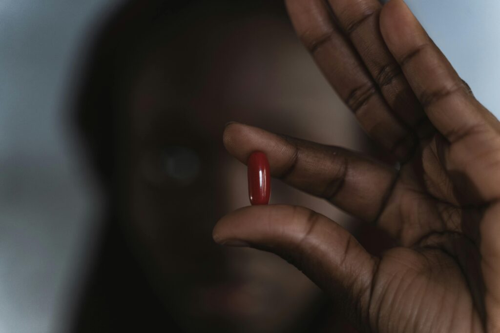 person taking a pill