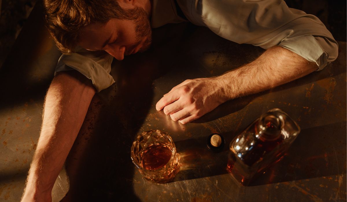 person struggling with alcohol addiction