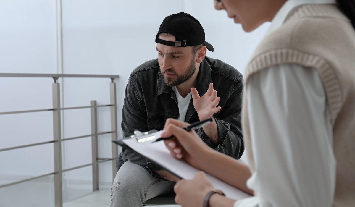 man at drug addiction therapy appointment